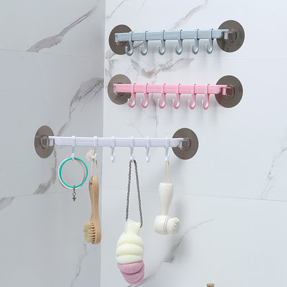 1 piece of strong adhesive hook with 6 hooks for hanging on kitchen walls, corners, or bathrooms without leaving any marks. Useful for hanging clothes and other items.