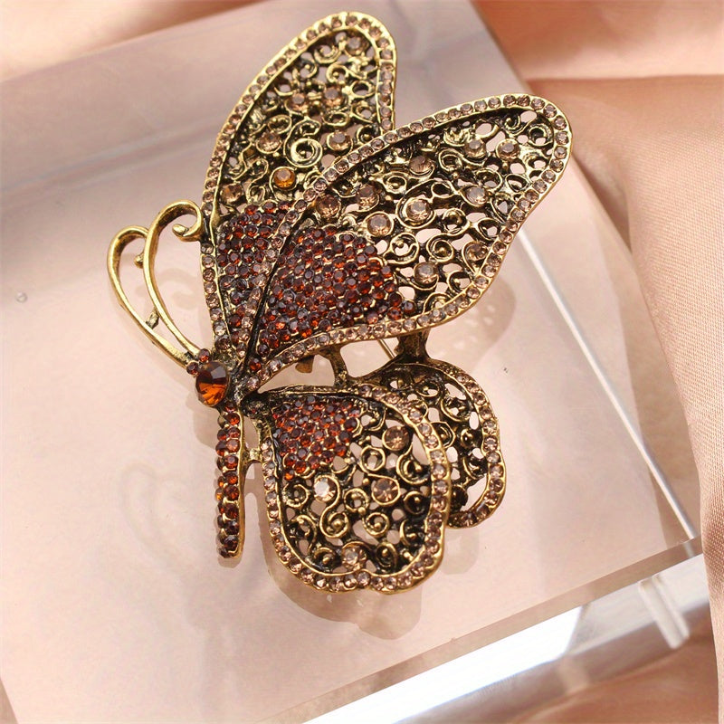 Luxurious and sophisticated butterfly brooch featuring an irregular shape and rhinestone detailing. This versatile accessory can be worn on clothing, bags, and hats. Comes in a set of 1.