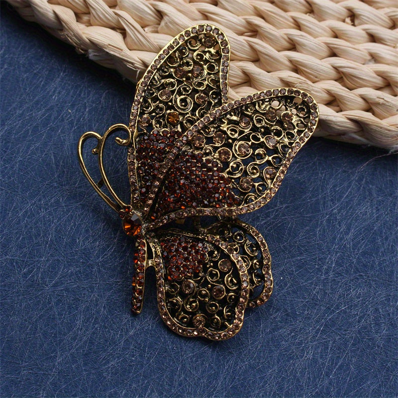 Luxurious and sophisticated butterfly brooch featuring an irregular shape and rhinestone detailing. This versatile accessory can be worn on clothing, bags, and hats. Comes in a set of 1.