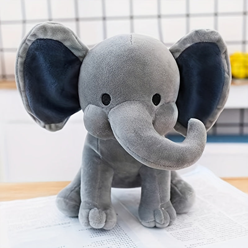 Soft and cuddly elephant plush toy, perfect for young children. Made of soft polyester, this is an ideal gift for both boys and girls. Great for parties and playtime. Available in bright pink and grey colors.