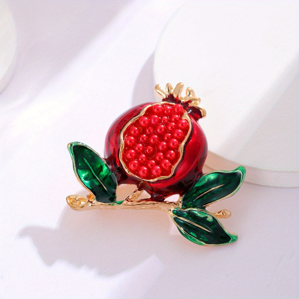 Stylish pomegranate brooch adorned with shimmering rhinestones, featuring a fruity emblem from the fruit series, a perfect accessory for any outfit.