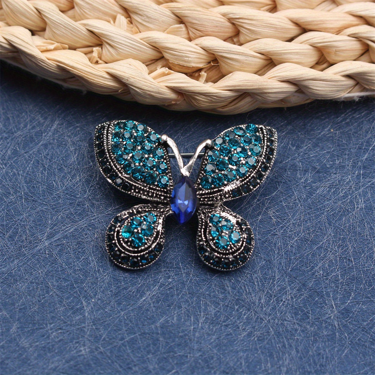 A Sophisticated Rhinestone Butterfly Brooch: Elevate Your Charm with this Versatile Accessory