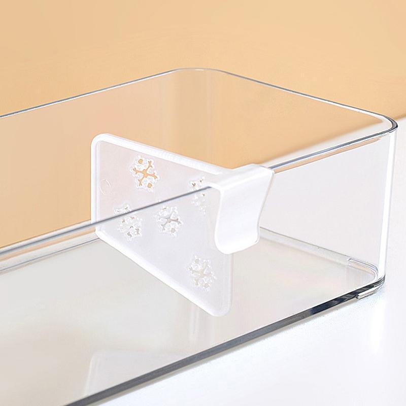 Set of 4 clear plastic refrigerator storage boxes in classic style, with partition clips. Made without any wood ingredients and requiring no electricity to operate.