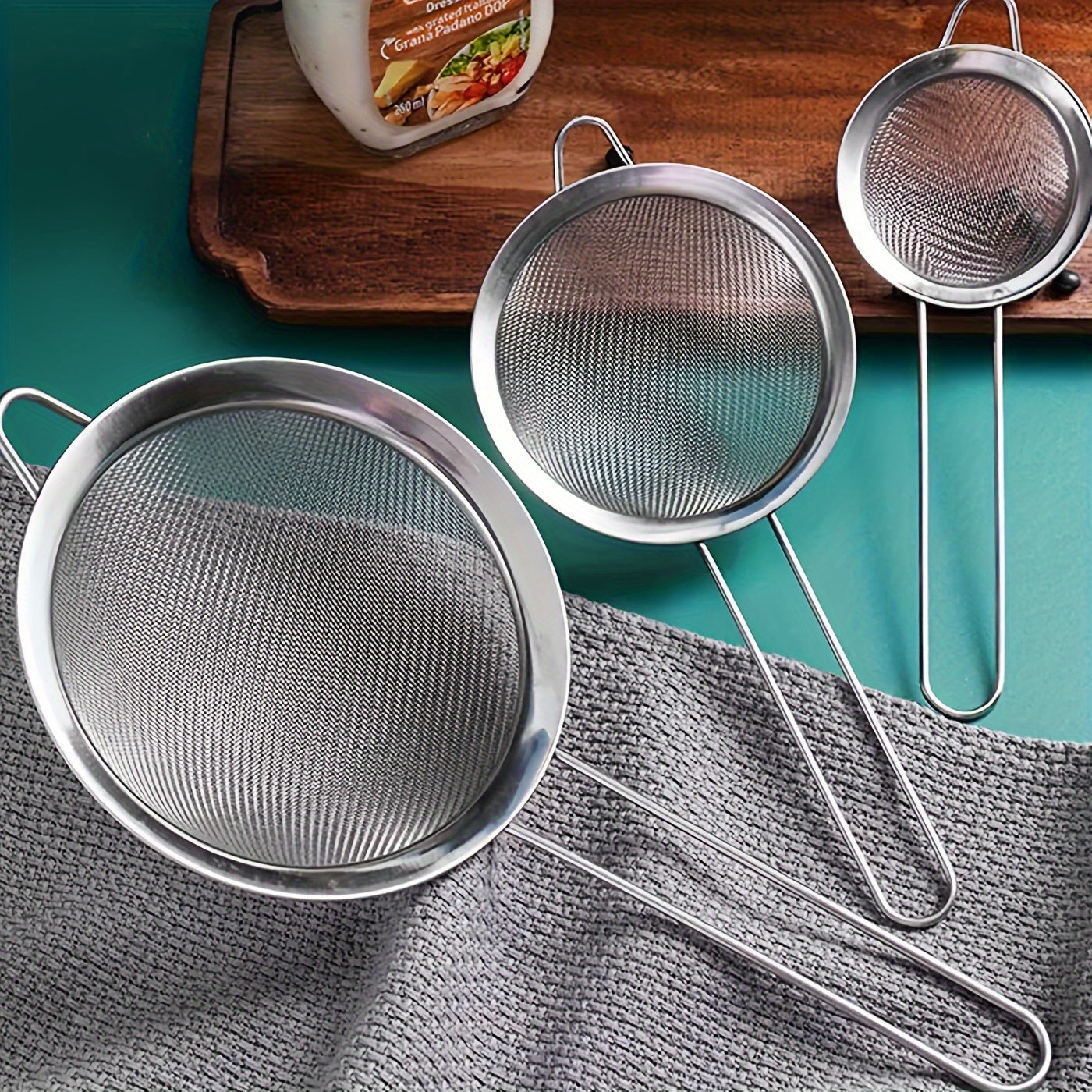 Set of 3 high-quality stainless steel strainers with fine mesh - Long-lasting, resistant to rust, and feature comfortable handles for easy use - Must-have tools for cooking and baking to create silky smooth sauces and sift flour evenly.