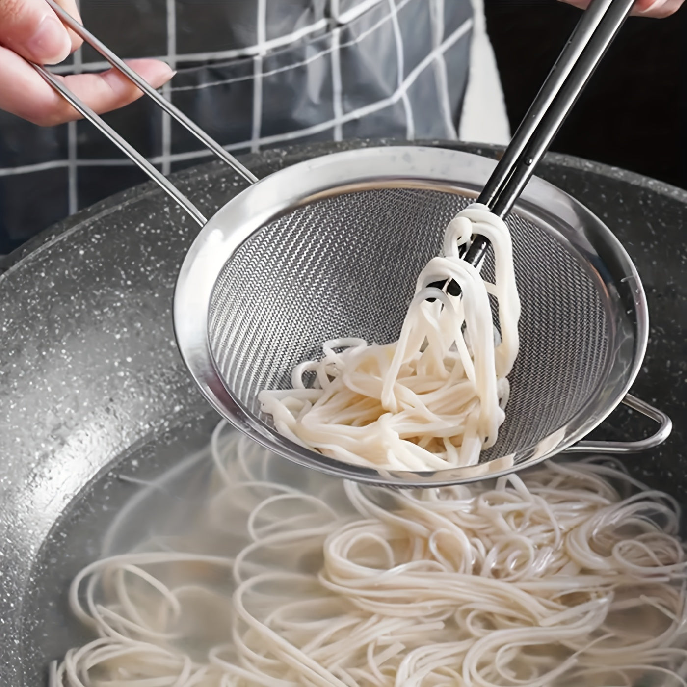 Set of 3 stainless steel fine mesh strainers with ergonomic handles - ideal for making smooth sauces and sifting flour in the kitchen. These kitchen essentials are durable, rust-resistant, and built to last.