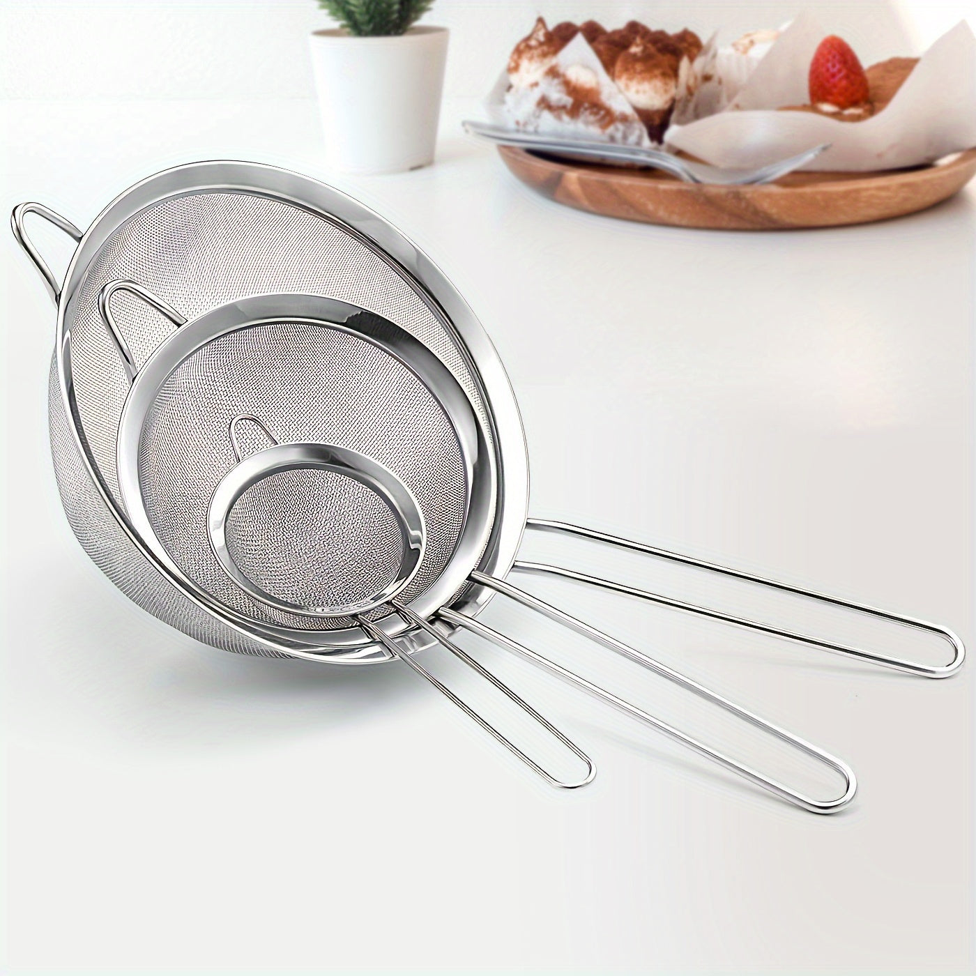 Set of 3 high-quality stainless steel strainers with fine mesh - Long-lasting, resistant to rust, and feature comfortable handles for easy use - Must-have tools for cooking and baking to create silky smooth sauces and sift flour evenly.