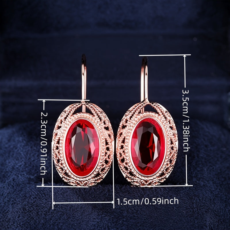 One pair of vintage-inspired rose golden hoop earrings with synthetic garnet, perfect for parties and special occasions. Made of nickel-free copper, suitable for all-season wear.