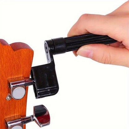 Guitar string winder tool for loosening strings.