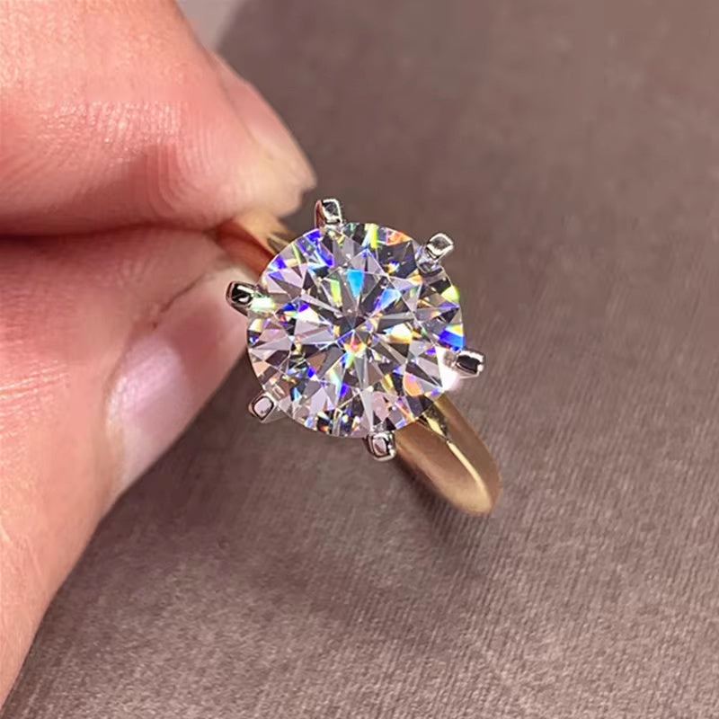 Celebrate the Season with the Shavano Vintage Sexy 18K Golden Plated 925 Sterling Silver Moissanite Engagement Ring. This stunning piece is the perfect Spring Festival gift, ideal for the Spring season, vacation occasions, and gift-giving. The 6 Prong