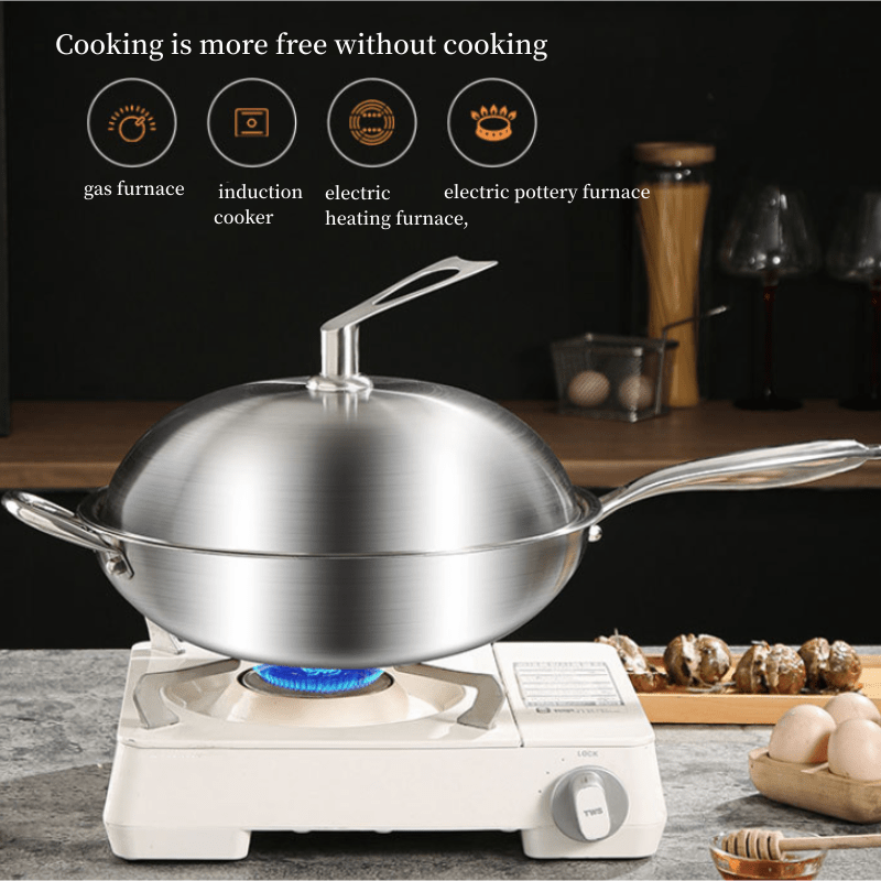 Universal Cookware Titanium qoplamali ko'p qatlamli wok, zarbali sirt, chizishdan himoyalangan, gaz pechlari va induksiyaga mos keladi.