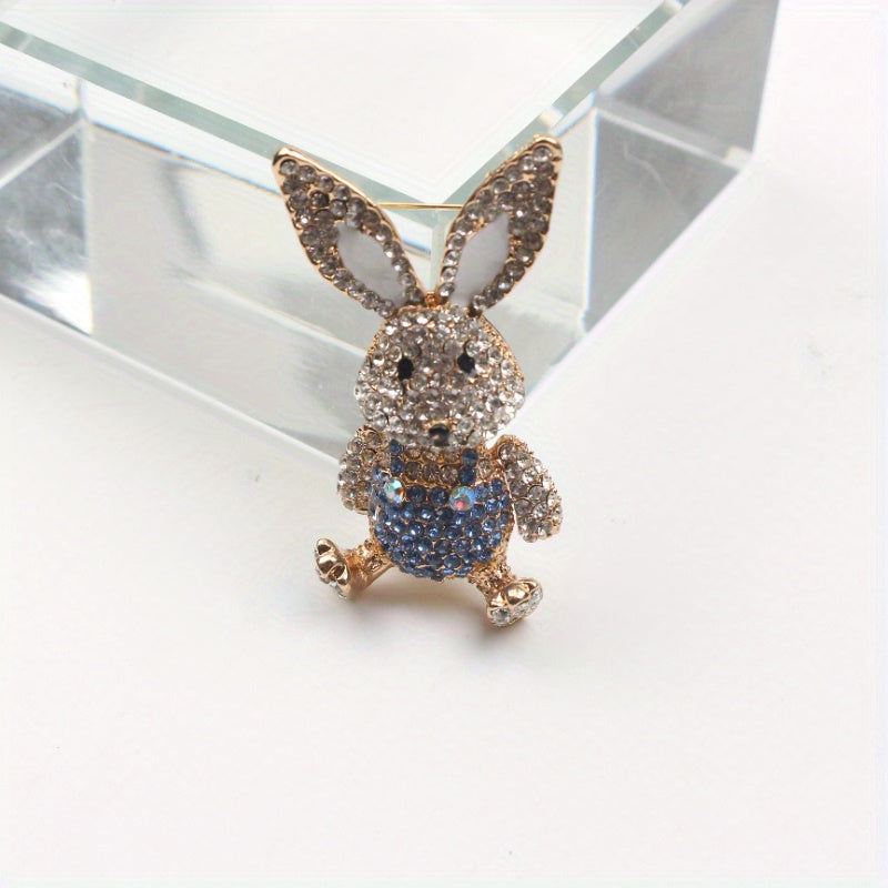 Chic Rabbit brooch adorned with rhinestones, cute enamel pin in animal shape with glistening diamonds, unique novelty lapel pin resembling simulation modeling for holiday gifting.