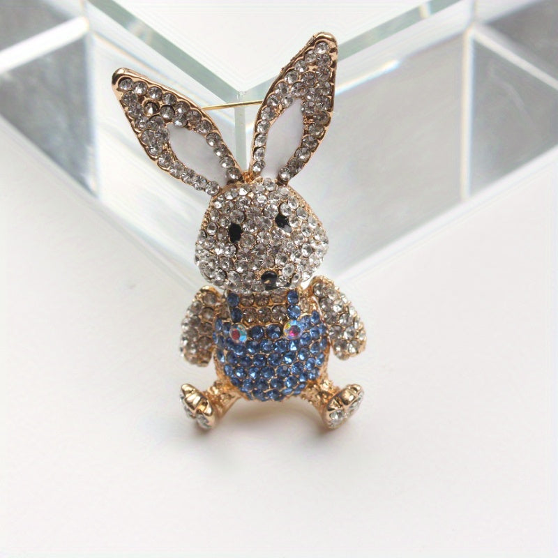 Chic Rabbit brooch adorned with rhinestones, cute enamel pin in animal shape with glistening diamonds, unique novelty lapel pin resembling simulation modeling for holiday gifting.