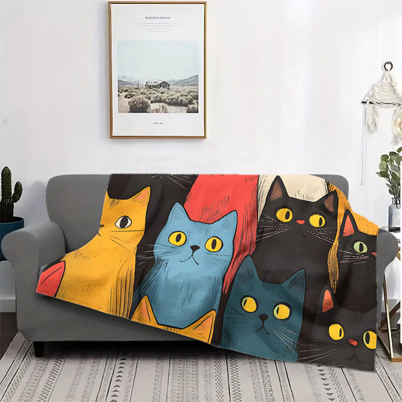 A cozy and adorable cat print blanket, made of flannel for extra warmth and softness. Perfect for cuddling up on the couch, in the office, or while camping or traveling. This multi-purpose blanket is a great gift for any occasion and suitable for all