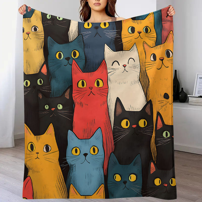 A cozy and adorable cat print blanket, made of flannel for extra warmth and softness. Perfect for cuddling up on the couch, in the office, or while camping or traveling. This multi-purpose blanket is a great gift for any occasion and suitable for all