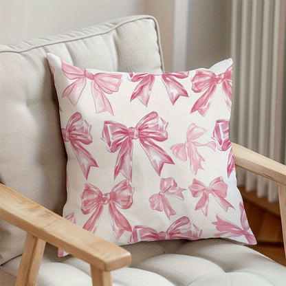 Chic pink bow print throw pillow cover, 44.96x44.96cm, contemporary style, 100% polyester with zip closure. Machine washable, perfect for living room sofa and bedroom decor. (Pillow insert not included) Great for couches.