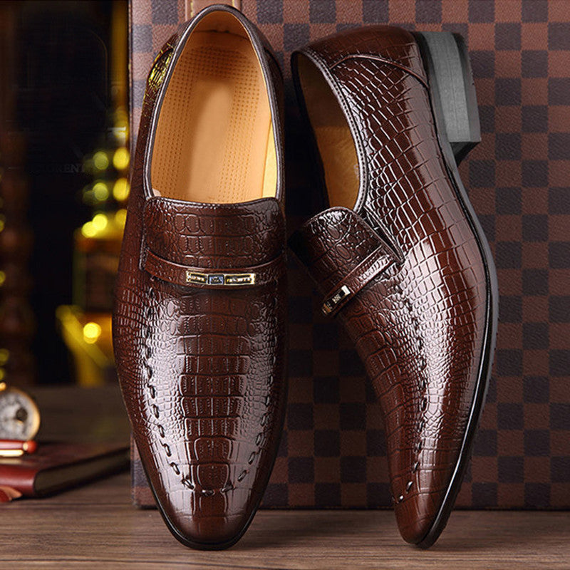 Brown penny loafers for men featuring crocodile texture, metallic buckle, suitable for business, office, parties, weddings.