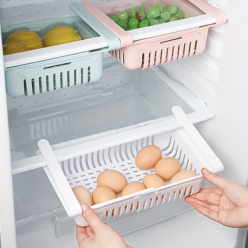 Get your hands on the 1pc Adjustable & Retractable Tiered Shelf Organizer designed specifically for refrigerators. This space-saving, multifunctional storage solution is made from durable plastic and is perfect for storing fruits, vegetables, and eggs.