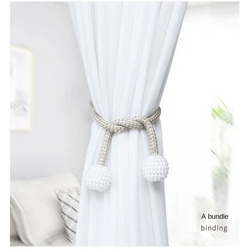 Two elegant magnetic curtain tiebacks adorned with faux pearls - a perfect decorative accessory for bedrooms and living rooms.