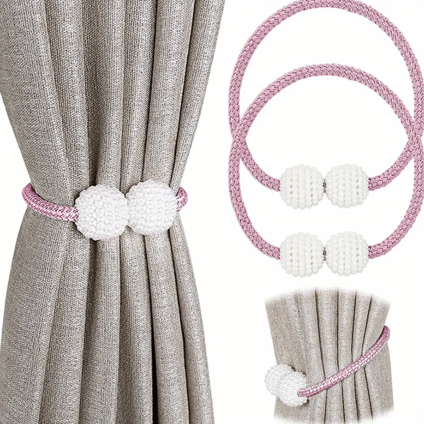 Two elegant magnetic curtain tiebacks adorned with faux pearls - a perfect decorative accessory for bedrooms and living rooms.