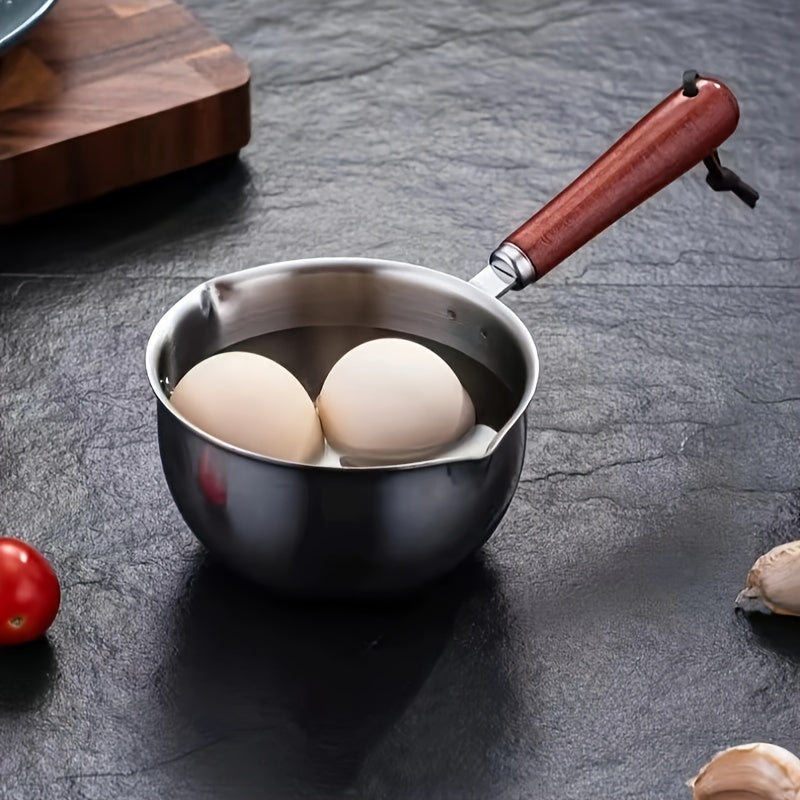 This Stainless Steel Mini Skillet features a Wooden Handle, making it ideal for Hot Oil & Food Prep. Perfect for use in Home Kitchens & Restaurants alike.