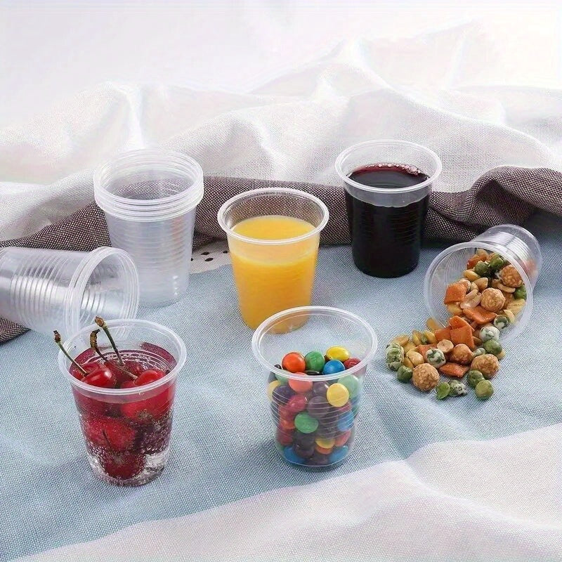 50 to 100 pieces of high-quality disposable plastic cups, with a clear design suitable for serving snacks, fruits, and cold drinks. These cups are recyclable and are perfect for use at home parties, restaurants, picnics, and other events.