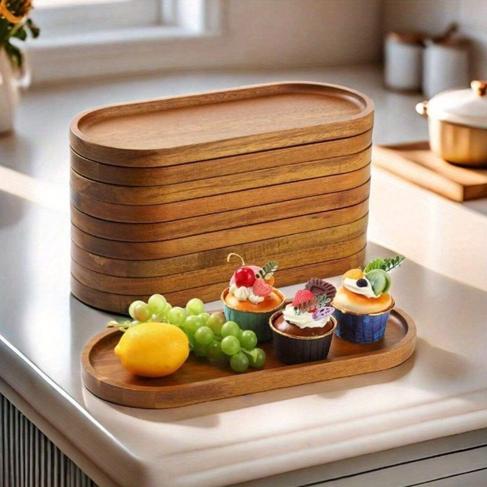 Acacia wood oval serving tray for kitchen or dining use, ideal for dinner parties, weddings, serving food, fruit, snacks or as a coffee table tray.