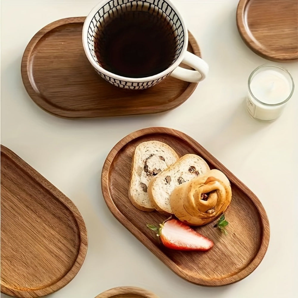 Acacia wood oval serving tray for kitchen or dining use, ideal for dinner parties, weddings, serving food, fruit, snacks or as a coffee table tray.