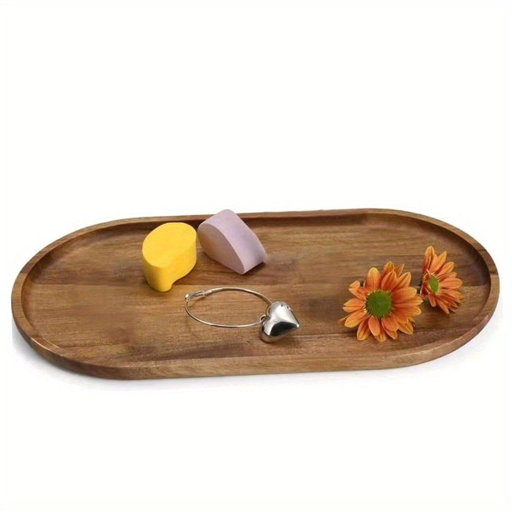 Acacia wood oval serving tray for kitchen or dining use, ideal for dinner parties, weddings, serving food, fruit, snacks or as a coffee table tray.