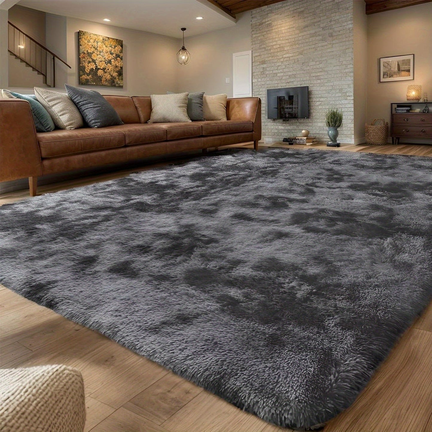 Upgrade your living space with this luxurious plush area mat, featuring ultra-soft, thick faux fur in a sleek gray with black accents. Perfect for adding a touch of elegance to your bedroom or living room decor, this large size rug is made of easy care