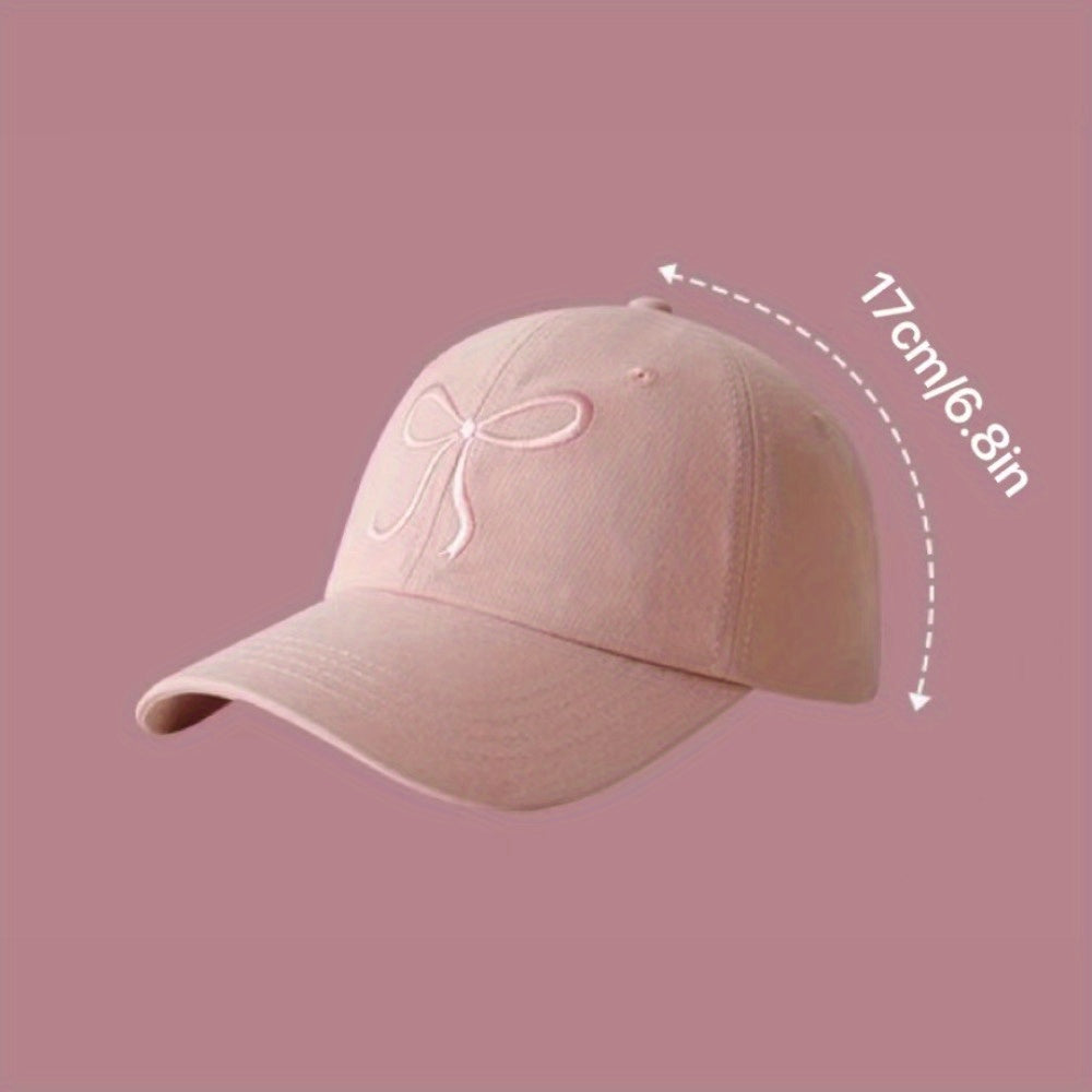 Adjustable bowknot baseball cap in sweet pink design, made of lightweight polyester. Comes in black, grey, apricot, and pink for casual wear.