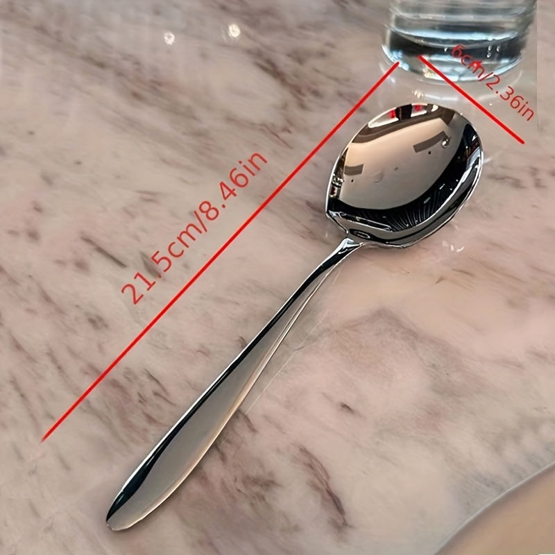 Durable stainless steel serving spoon with ergonomic handle for kitchen, dining, and restaurant use.