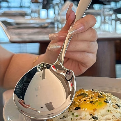 Durable stainless steel serving spoon with ergonomic handle for kitchen, dining, and restaurant use.