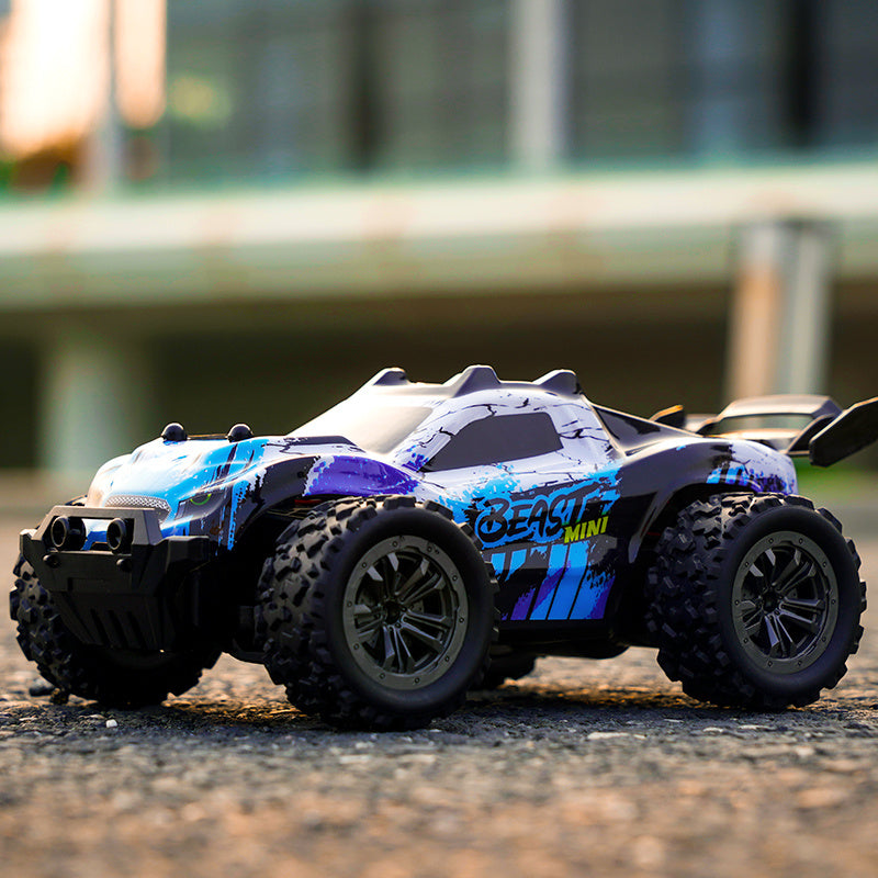 ZLL SG318 PRO 1:20 Scale High-Speed RC Car with "BEAST MINI" Design, 20km/h Off-Road Monster Truck, Durable Blue and Black. Features include 2.4G Remote Control, USB Rechargeable Battery