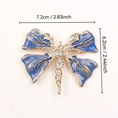 Chic Enamel Dragonfly Brooch adorned with Rhinestones, Unique Shape Fashion Pin for Clothing and Festive Gifts, exuding Luxury and Elegance.