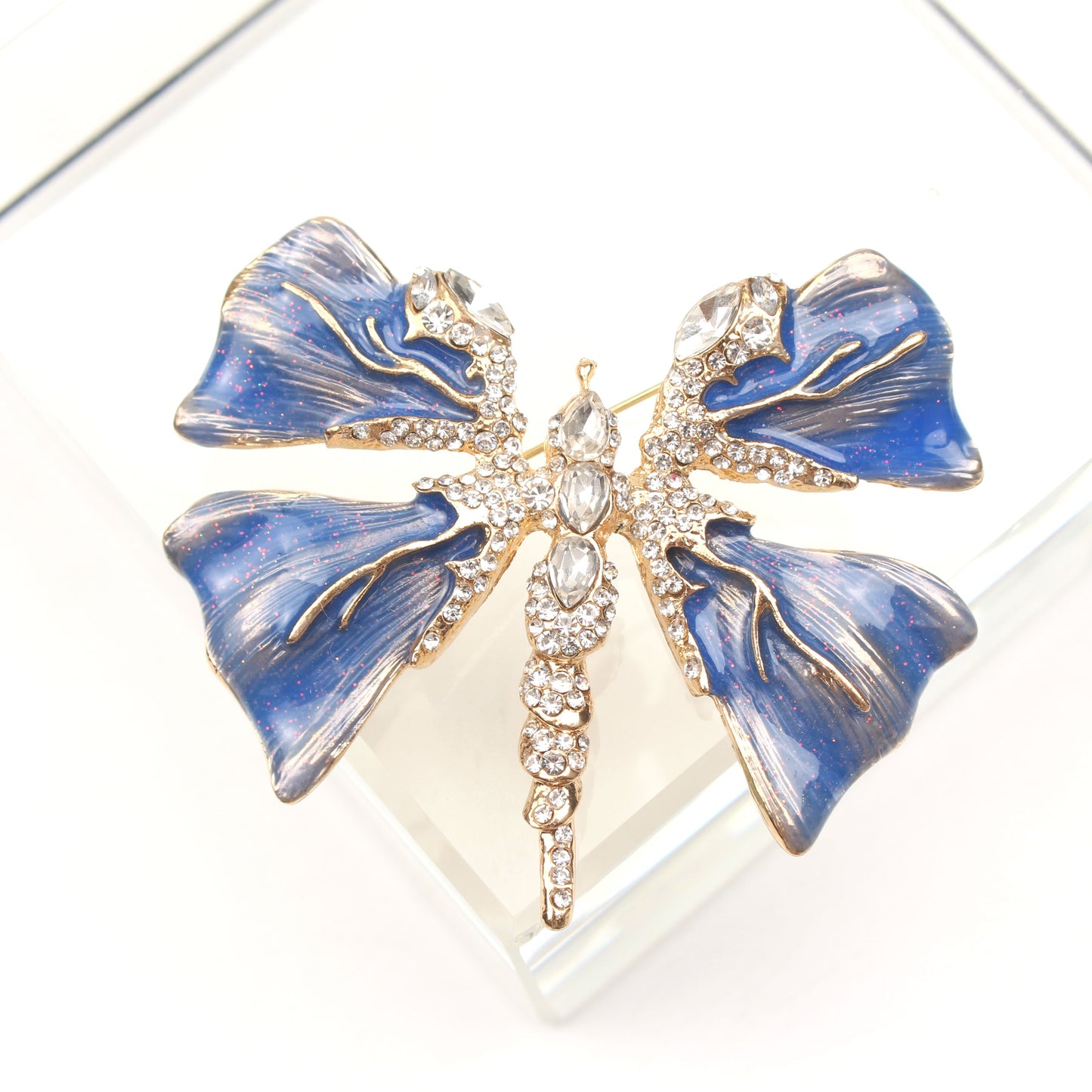 Chic Enamel Dragonfly Brooch adorned with Rhinestones, Unique Shape Fashion Pin for Clothing and Festive Gifts, exuding Luxury and Elegance.