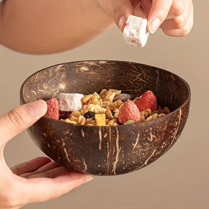 Set of two handcrafted coconut shell salad bowls with matching wooden spoons - Eco-friendly and ideal for serving salads, fruits, and cereals