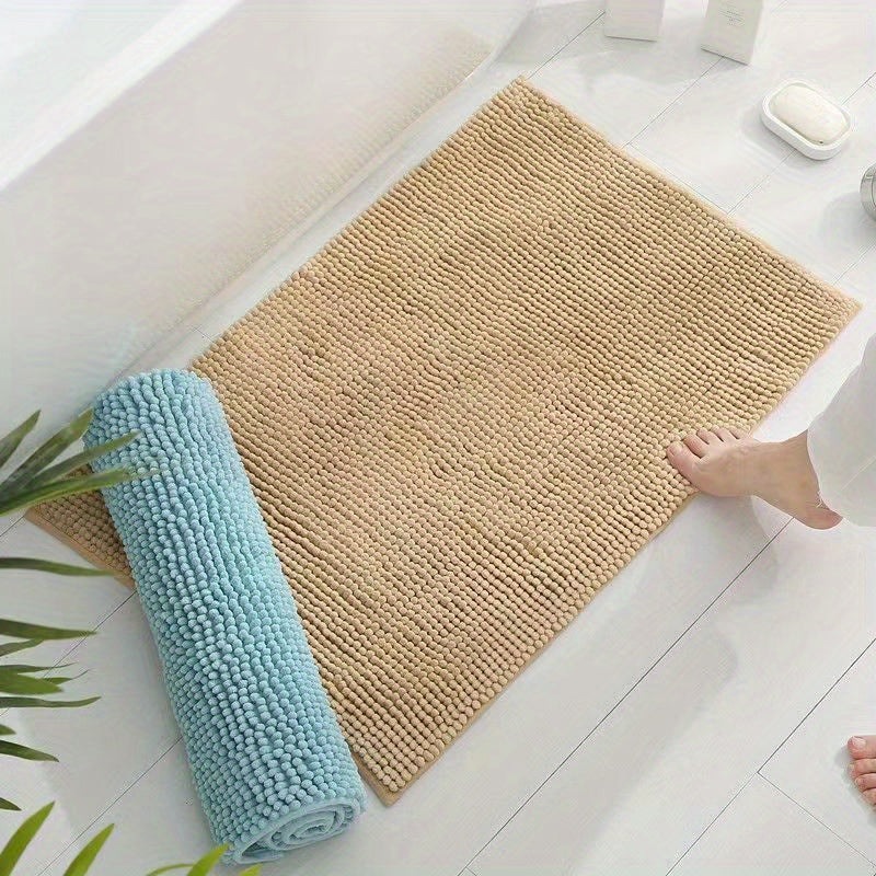 Luxurious chenille bathroom carpet that is ultra soft and non-slip, featuring absorbent plush fibers. This durable mat is machine washable, making it perfect for showers, bathtubs, and doorways.