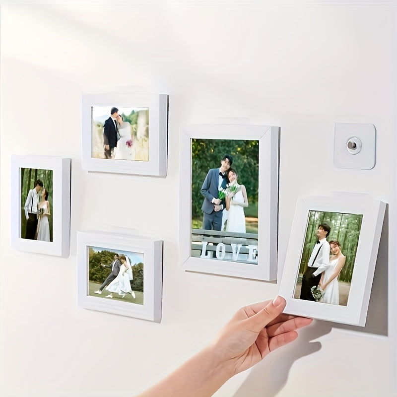 30 self-adhesive picture hangers for easy hanging of photos and posters without drilling holes, with strong adhesive hooks for wall decor.