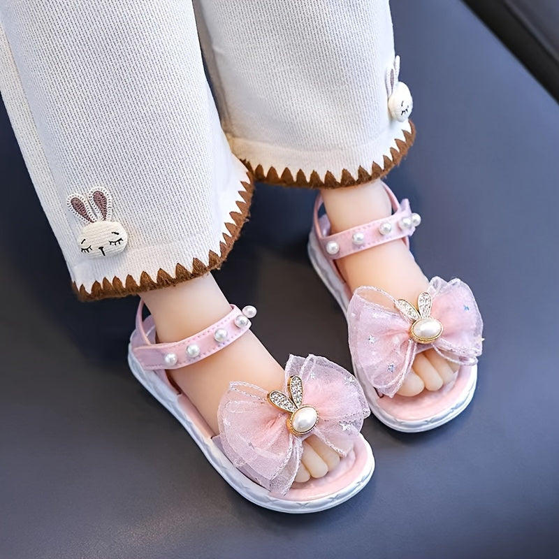 Breathable sandals with bows for girls, ideal for outdoor activities.