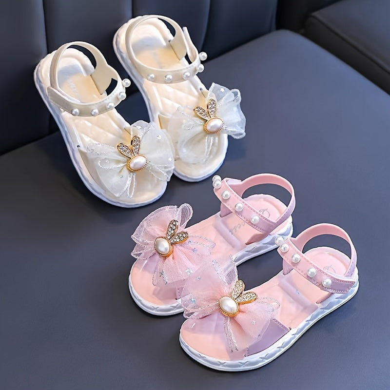 Breathable sandals with bows for girls, ideal for outdoor activities.