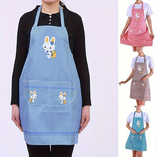 Blue checkered cooking apron with adjustable straps and cute rabbit and floral design, perfect for chefs, gardening, and baking. Oil and stain resistant with a handy pocket.