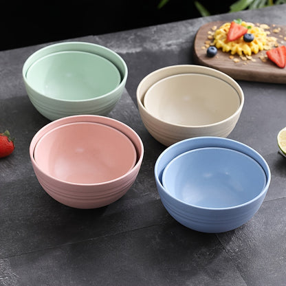 Set of 4 high-quality, unbreakable wheat straw bowls in pastel colors. Microwave and dishwasher safe, BPA-free, rust-resistant, ideal for home or office.