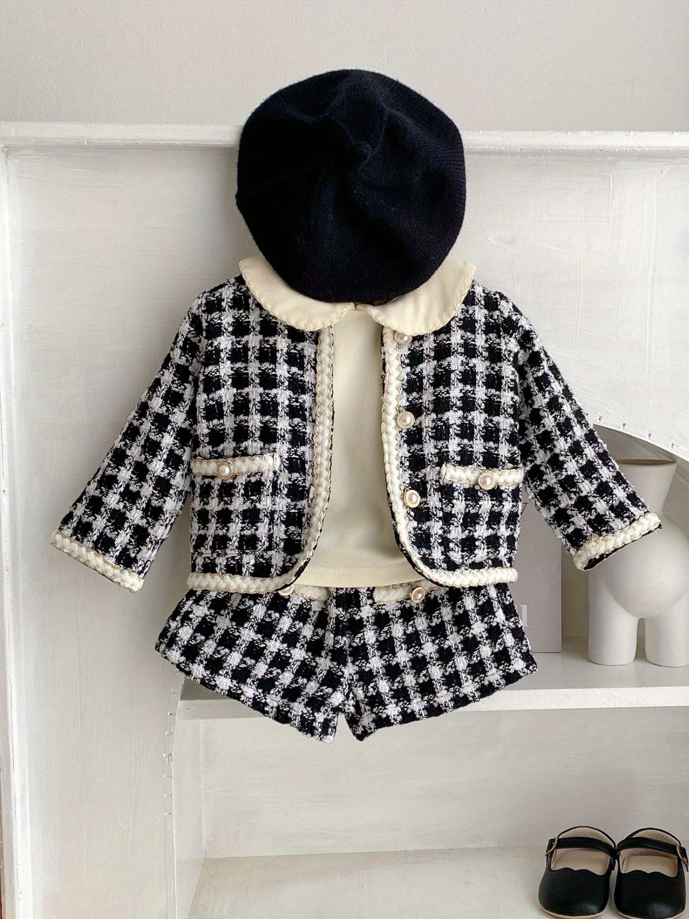 Stylish two-piece outfit with checkered shirt jacket and shorts, ideal for spring and autumn children's parties outdoor.