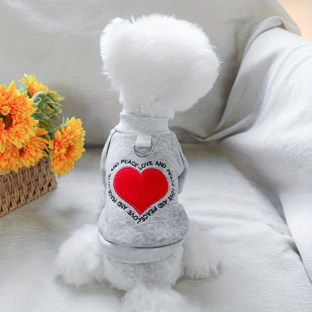 Soft knit heart-shaped pet sweater for small dogs, suitable for all seasons.