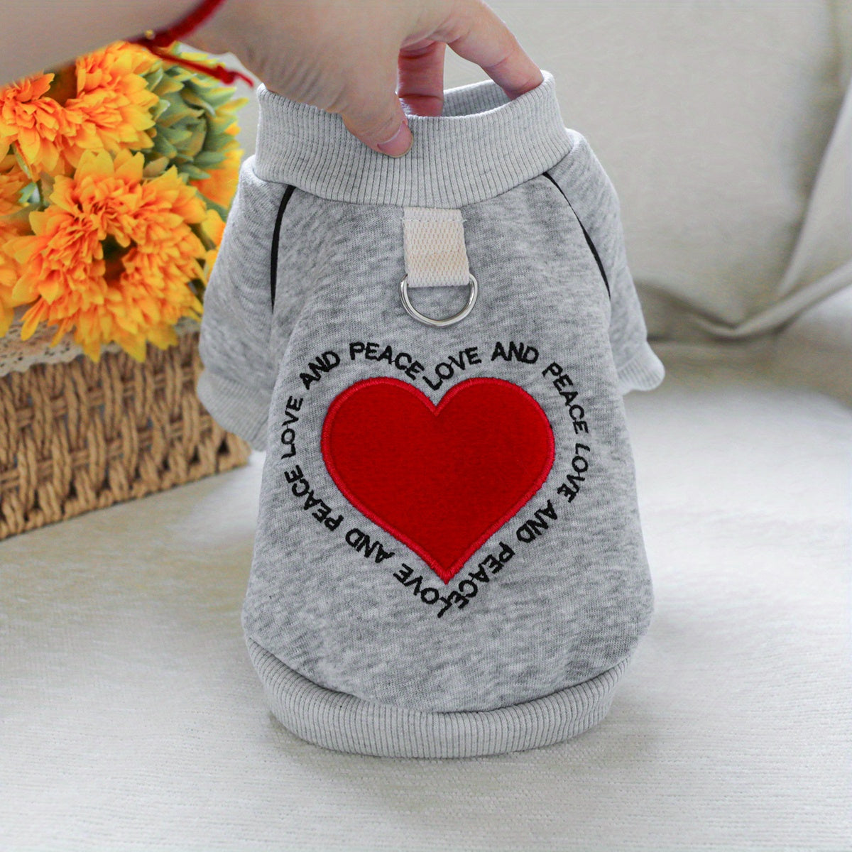 Soft knit heart-shaped pet sweater for small dogs, suitable for all seasons.