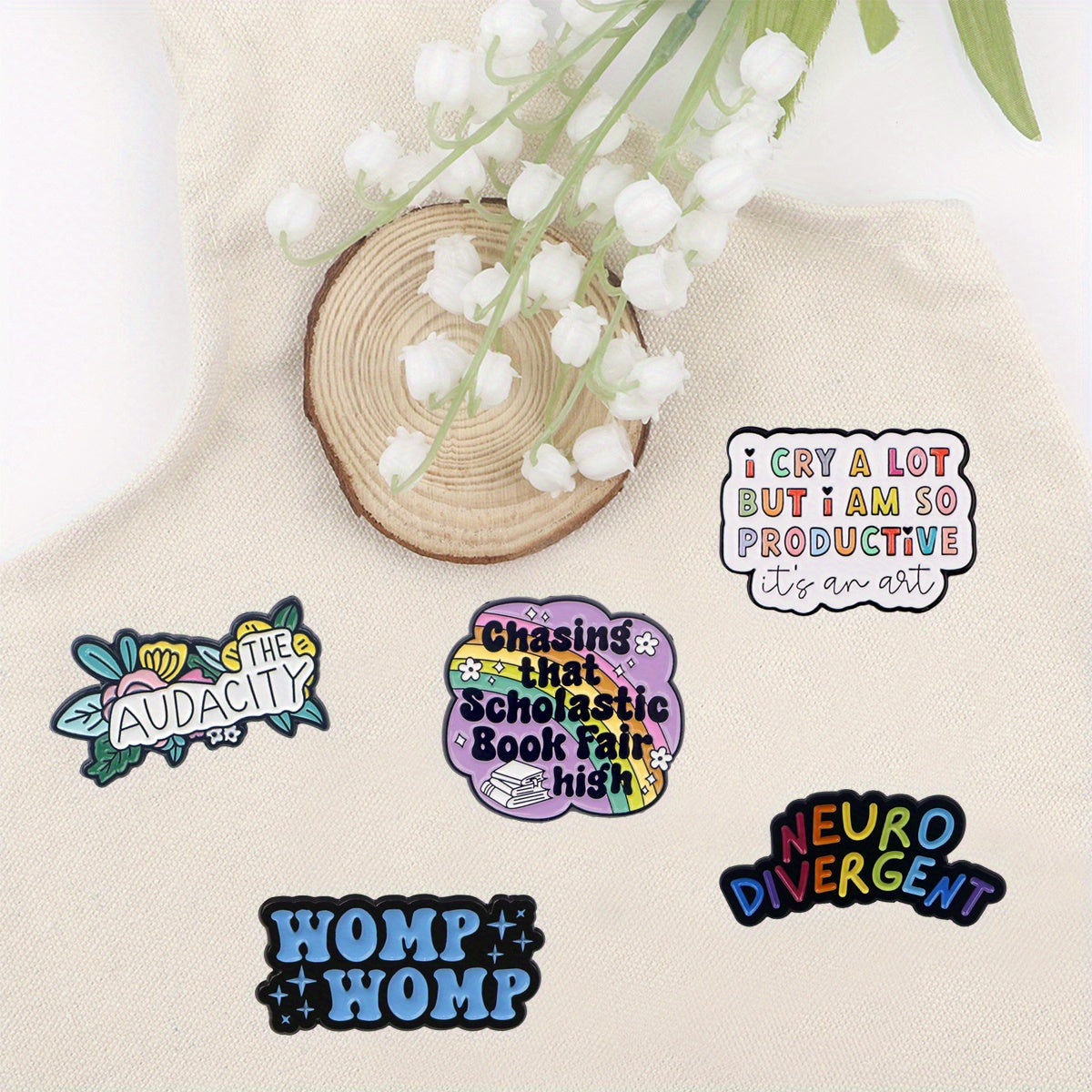 Collection of 20 enamel pins featuring inspirational quotes, perfect for adding to lapels, hats, clothes, backpacks, and more. Makes a great gift for friends and loved ones.