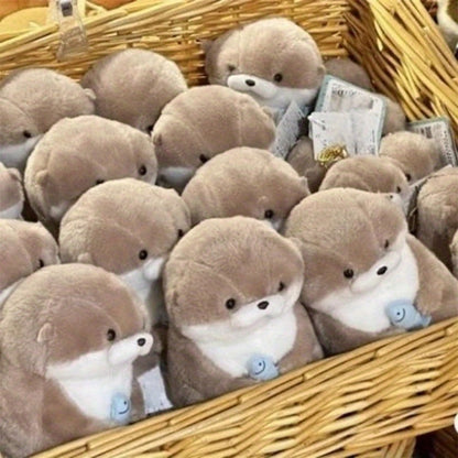 Cute hugging otter plush toy