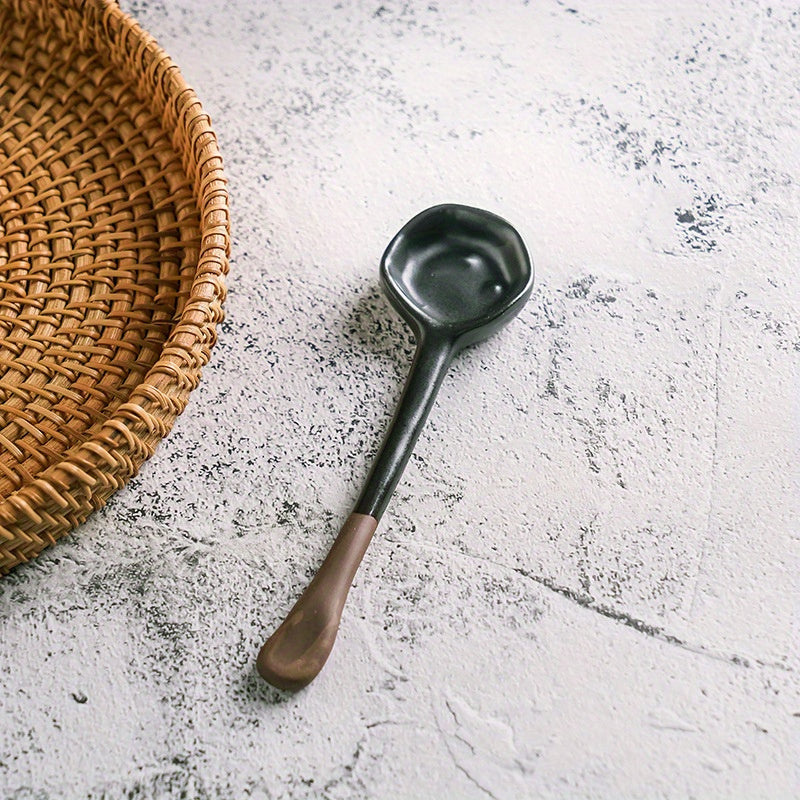 This long-handled Japanese ceramic coffee spoon has a rustic charm and is ideal for stirring tea or coffee. Made of heat-resistant ceramic material, it serves as a stylish accessory for your kitchen and dining experience.