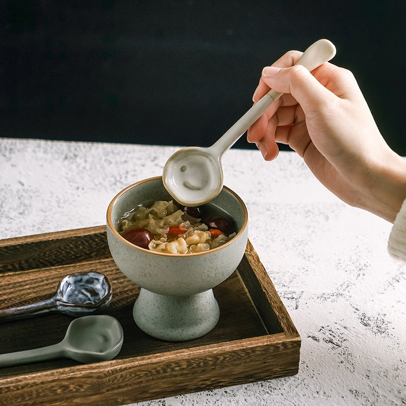 This long-handled Japanese ceramic coffee spoon has a rustic charm and is ideal for stirring tea or coffee. Made of heat-resistant ceramic material, it serves as a stylish accessory for your kitchen and dining experience.