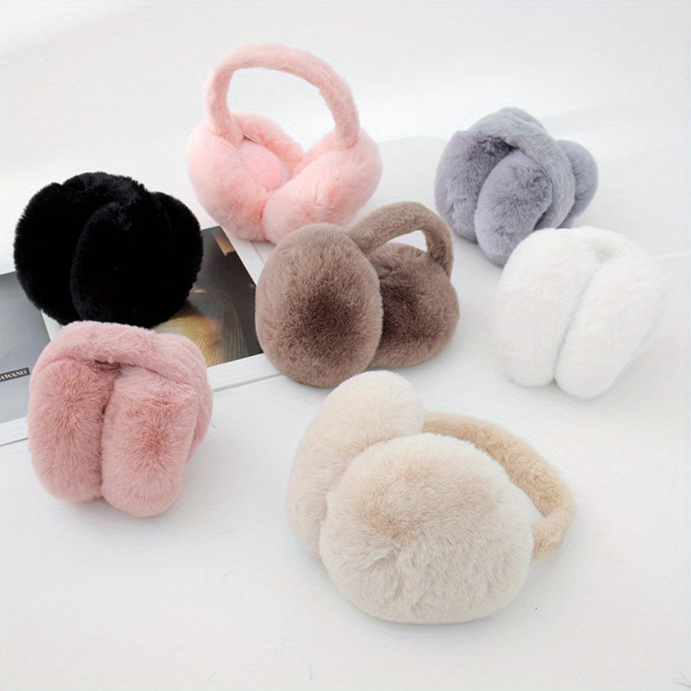 Stay cozy and stylish this winter with our Women's Foldable Knit Cashmere Earmuffs. Crafted with faux fur for warmth and comfort, these earmuffs are perfect for outdoor activities. The stretchable plush design hugs your ears, keeping them